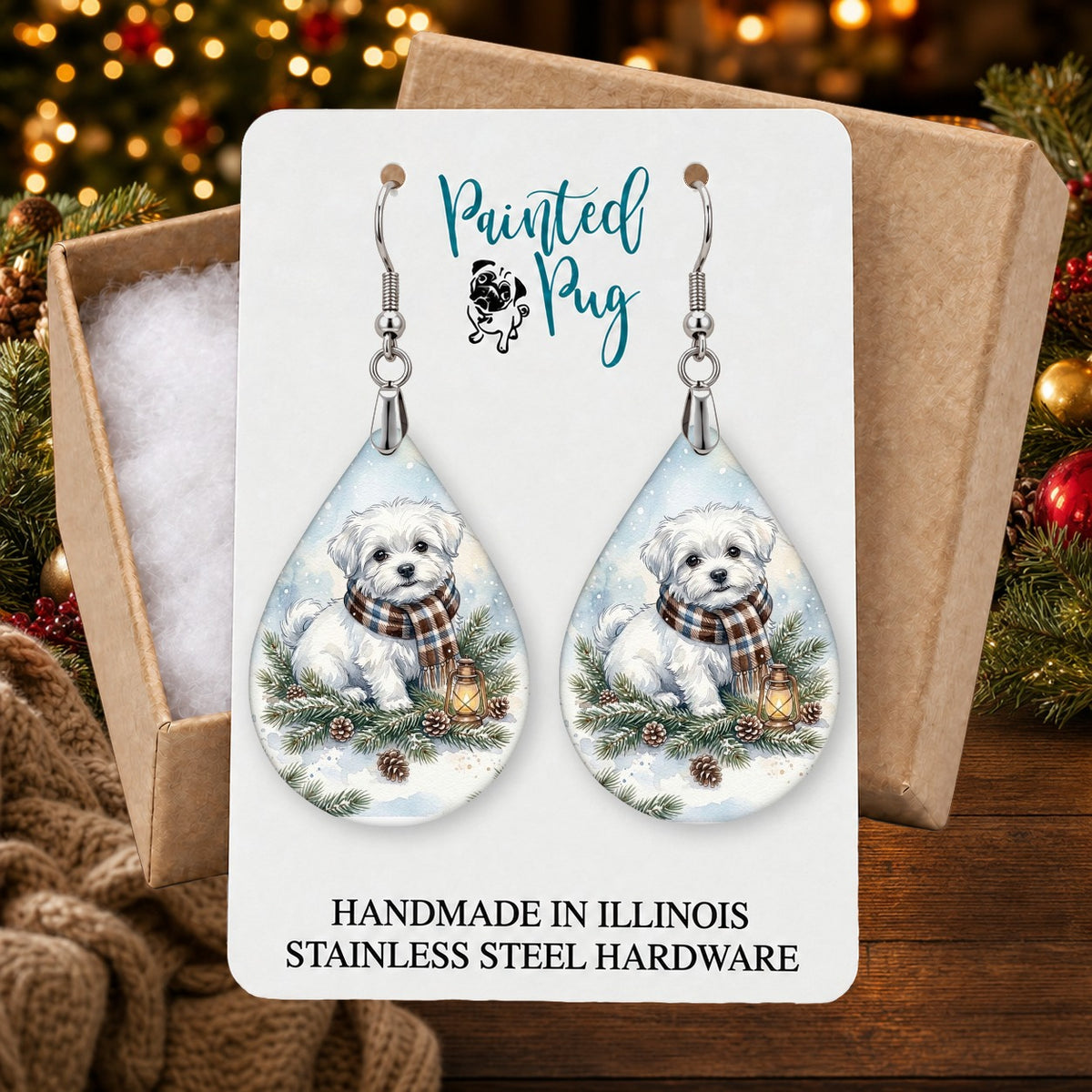 Maltese Winter Woodland earrings in a gift box on a Christmas table