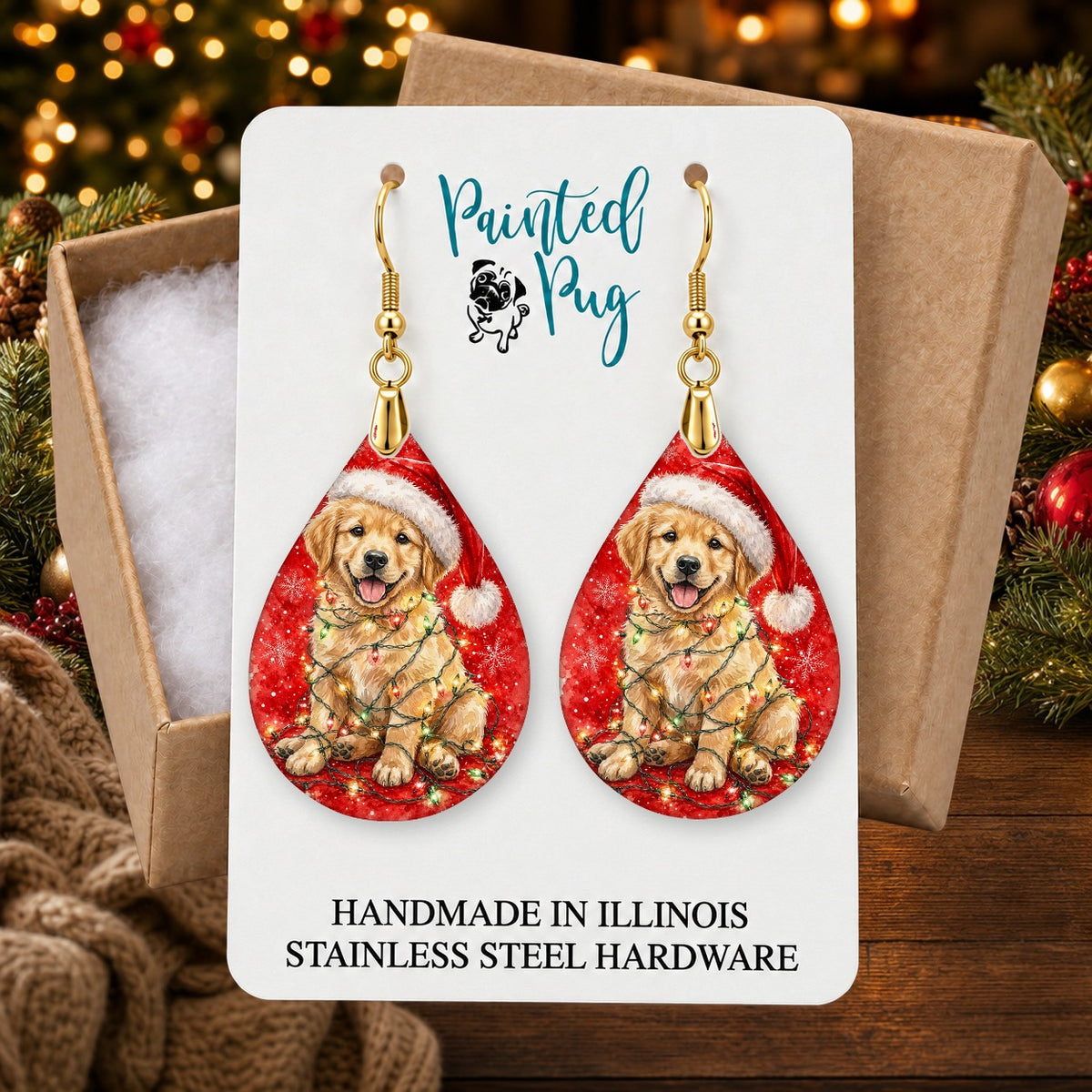 Golden Retriever Christmas Lights earrings in a gift box on a Christmas table