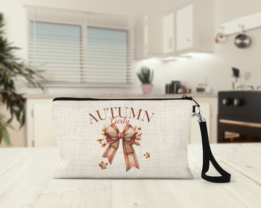 Autumn Girly Bow Makeup Bag on a kitchen counter