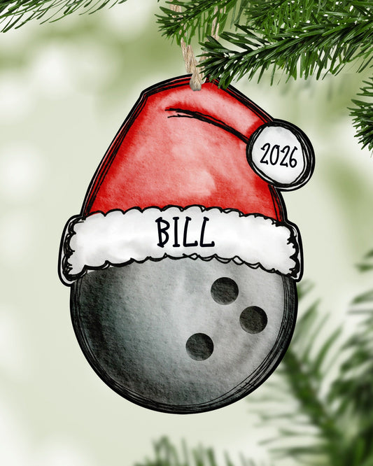 Personalized bowling Christmas ornament hanging on a Christmas tree - The Painted Pug