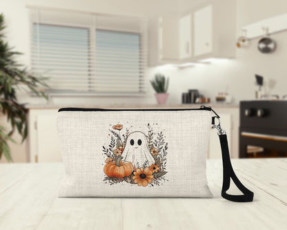 Cute Ghost and Pumpkins Makeup Bag on a kitchen counter