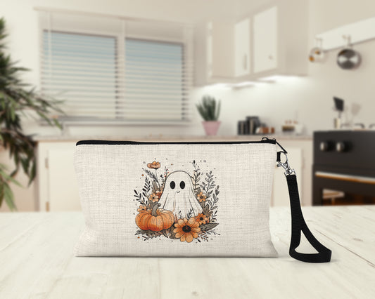 Cute Ghost and Pumpkins Makeup Bag on a kitchen counter
