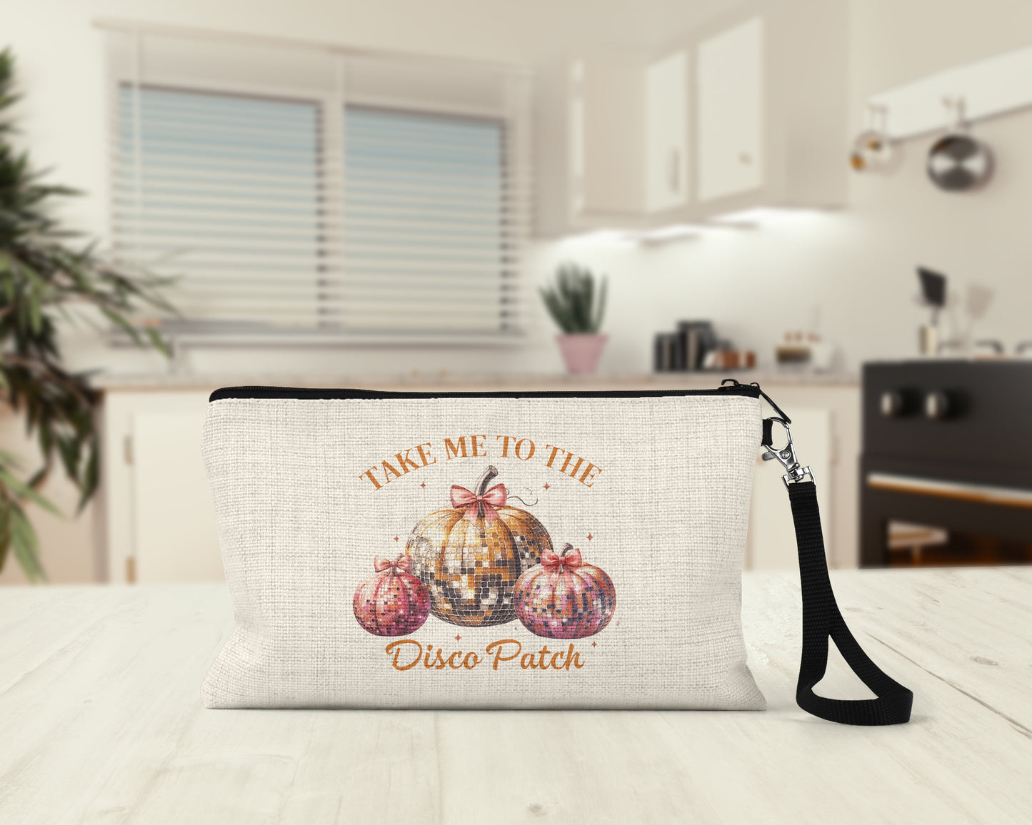 Take Me to the Disco Patch Makeup Bag on a kitchen counter