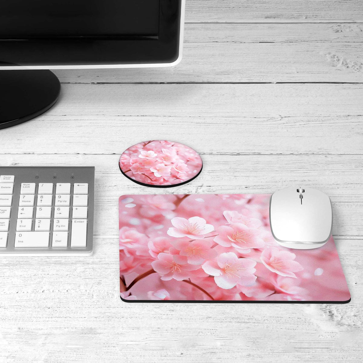 Pink cherry blossom desk set on a desk