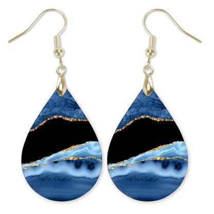 Blue and Gold Teardrop Earrings on white