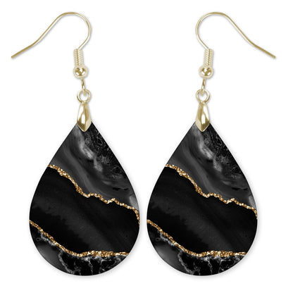 Black and Gold Teardrop Earrings on white