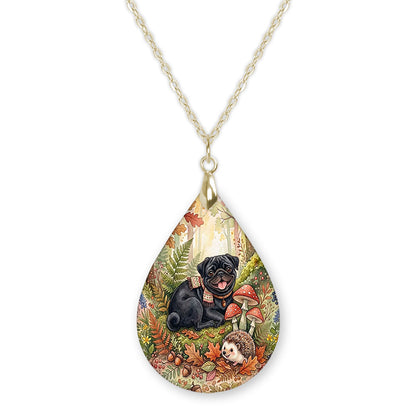 Black pug woodland teardrop necklace on a gold chain