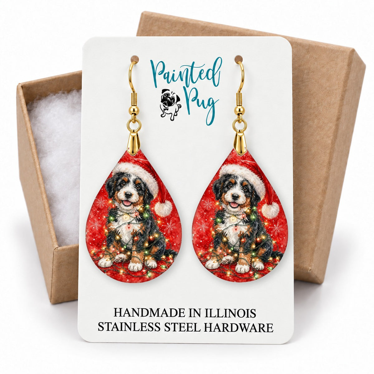 Bernedoodle Christmas Lights teardrop earrings on a gift box card