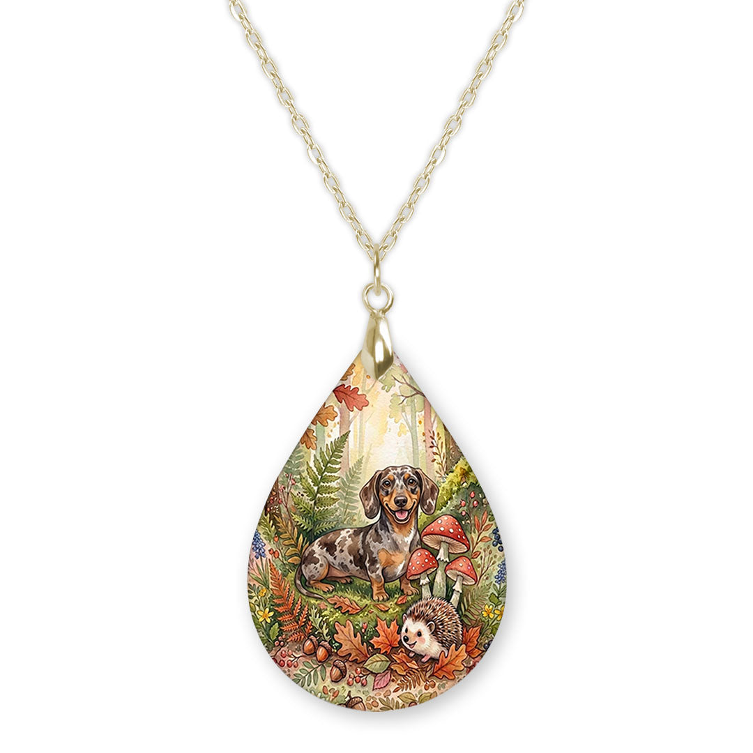 Dachshund woodland teardrop necklace on a gold chain