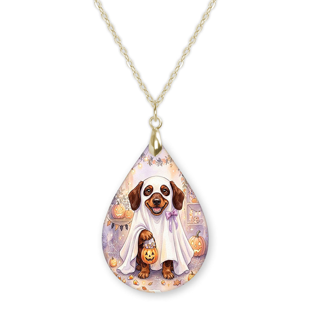 Dachshund in a ghost costume teardrop necklace on a gold chain