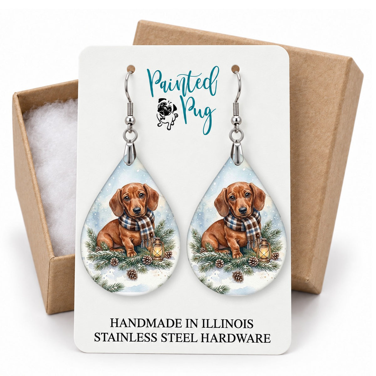Dachshund Winter Woodland teardrop earrings on a gift box card