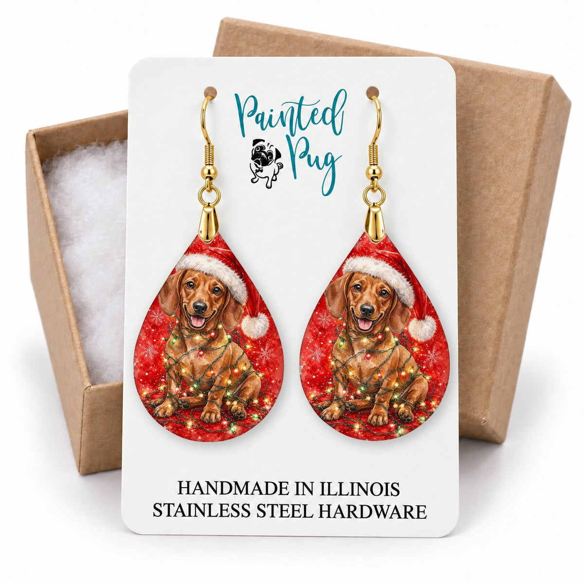 Dachshund Christmas Lights teardrop earrings on a gift box card