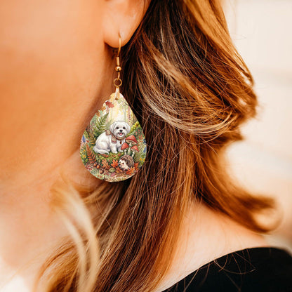 Maltese woodland teardrop earrings shown on a model