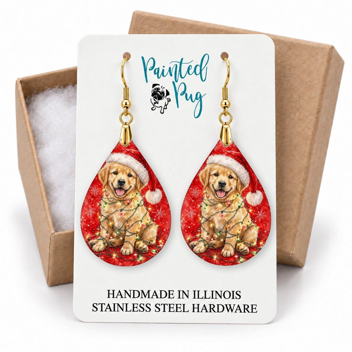 Golden Retriever Christmas Lights teardrop earrings on a gift box card