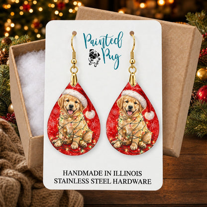 Golden Retriever Christmas Lights earrings in a gift box on a Christmas table