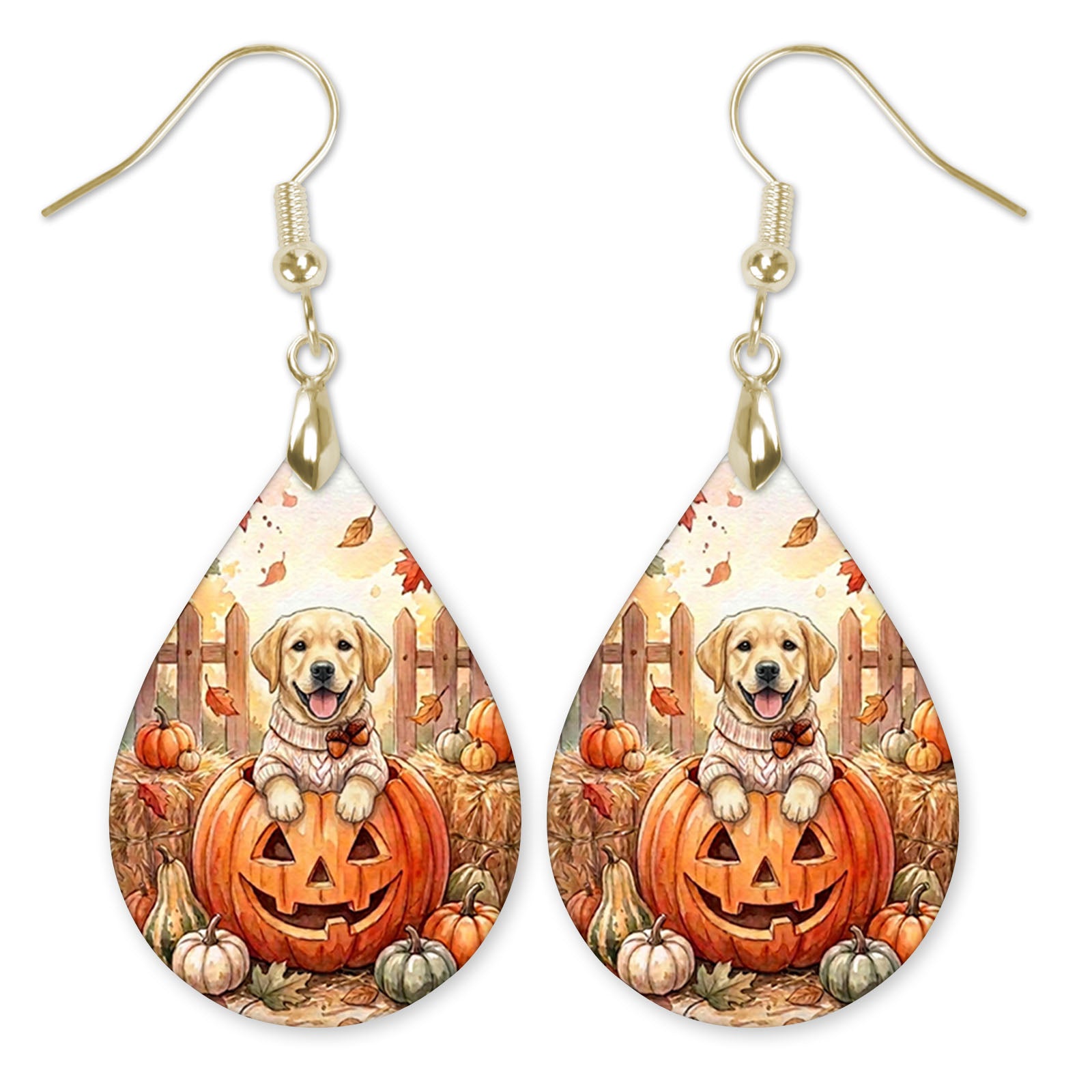 Yellow Lab in a cream sweater on a jack-o'-lantern teardrop earrings with gold-tone hooks