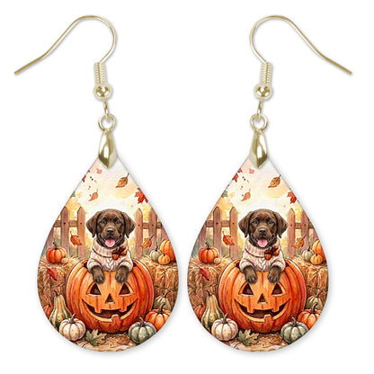 Chocolate Lab in a cream sweater on a jack-o'-lantern teardrop earrings with gold-tone hooks