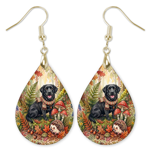 Black Lab in an autumn woodland teardrop earrings with gold-tone hooks