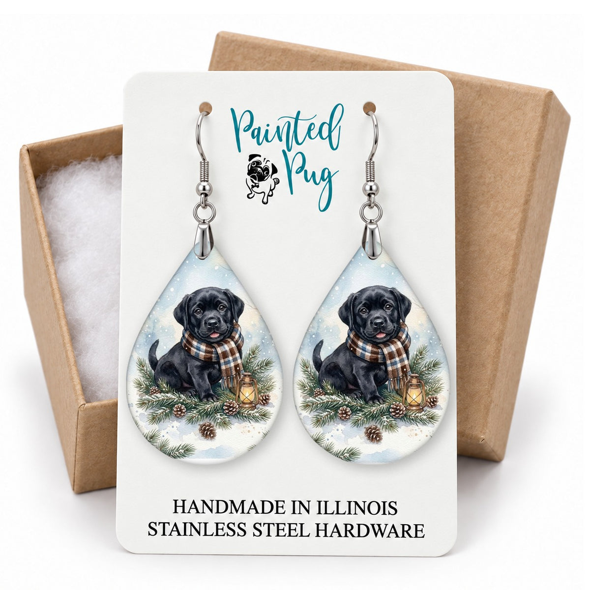 Black Lab Winter Woodland teardrop earrings on a gift box card
