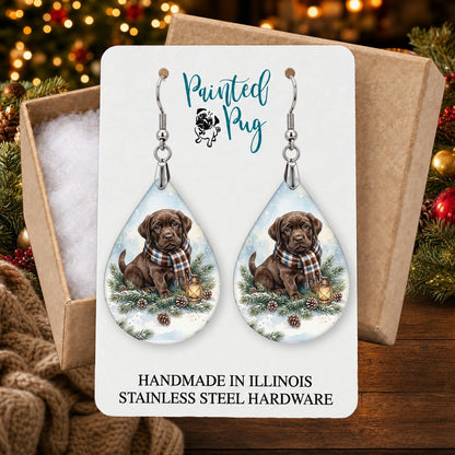 Chocolate Lab Winter Woodland earrings in a gift box on a Christmas table