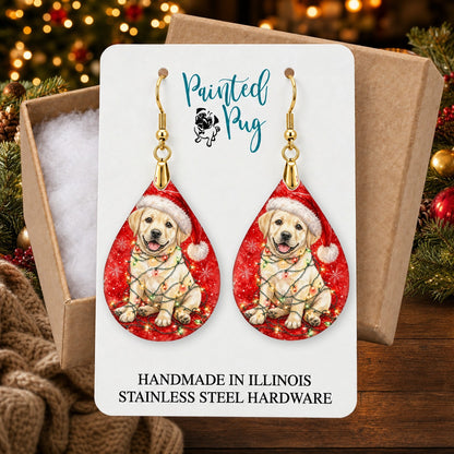 Yellow Lab Christmas Lights earrings in a gift box on a Christmas table