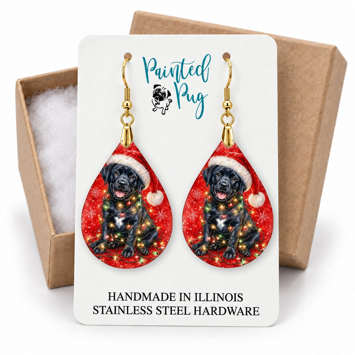 Black Lab Christmas Lights teardrop earrings on a gift box card