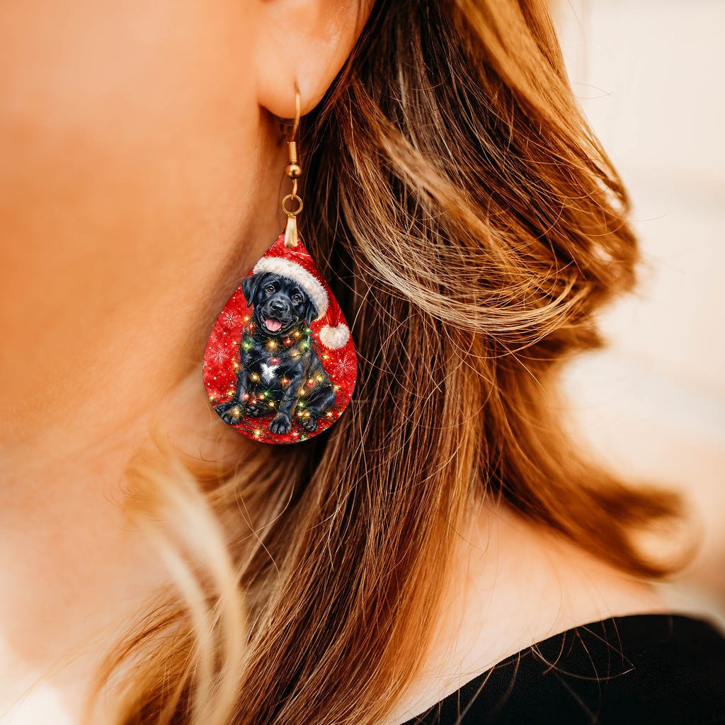 Black Lab Christmas Lights teardrop earrings worn by a model, close-up