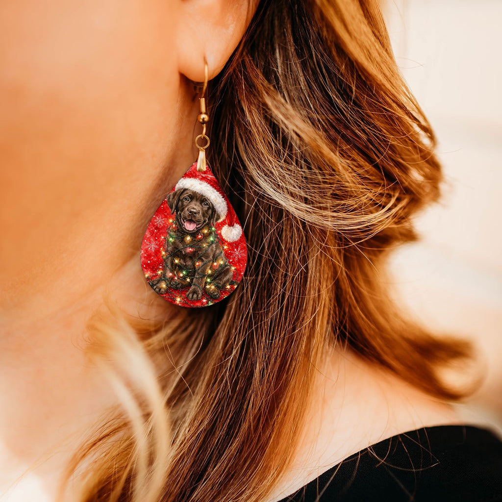 Chocolate Lab Christmas Lights teardrop earrings worn by a model, close-up