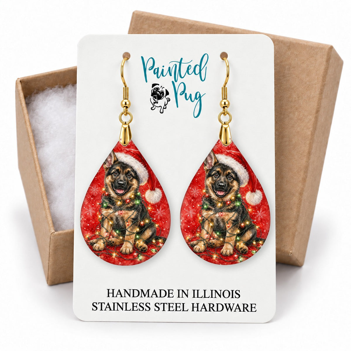 German Shepherd Christmas Lights teardrop earrings on a gift box card
