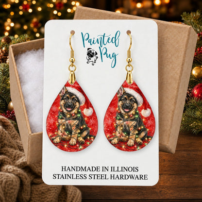 German Shepherd Christmas Lights earrings in a gift box on a Christmas table