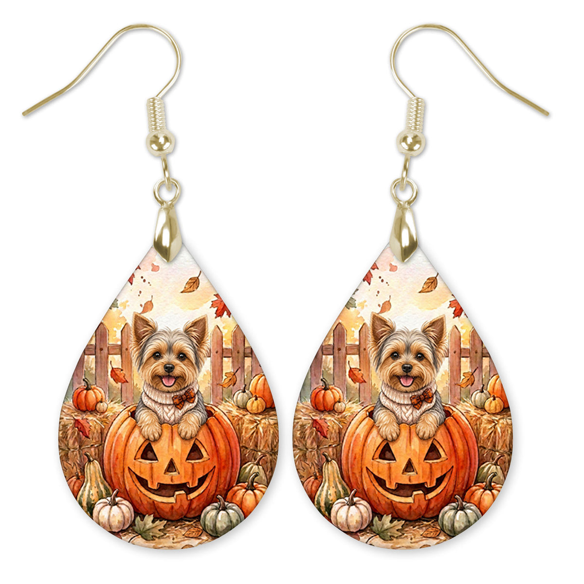 Yorkie in a cream sweater in a jack-o'-lantern teardrop earrings with gold-tone hooks