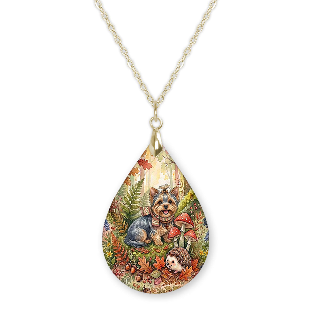 Yorkie woodland teardrop pendant necklace on a gold-tone chain