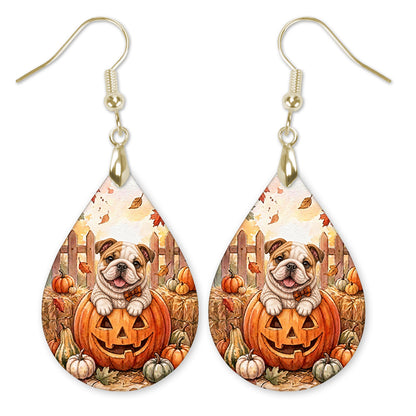 Bulldog in a cream sweater in a jack-o'-lantern teardrop earrings with gold-tone hooks