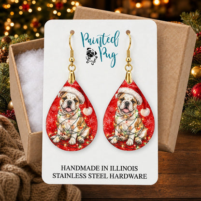 Bulldog Christmas Lights earrings in a gift box on a Christmas table