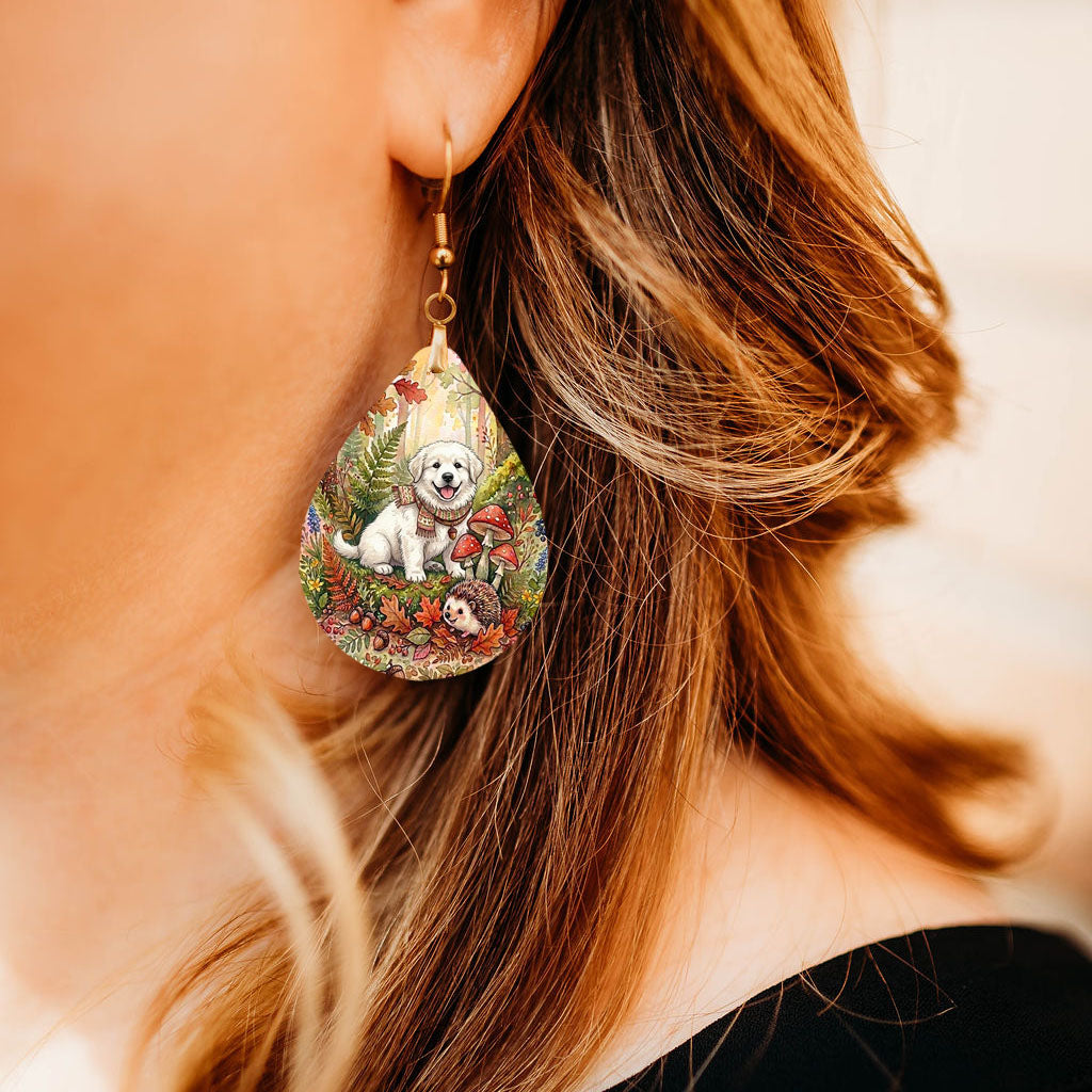 Model wearing Great Pyrenees woodland teardrop earrings