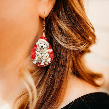 Great Pyrenees Christmas Lights teardrop earrings worn by a model, close-up