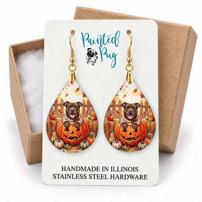 Pitbull pumpkin teardrop earrings on a Painted Pug earring card with a kraft gift box