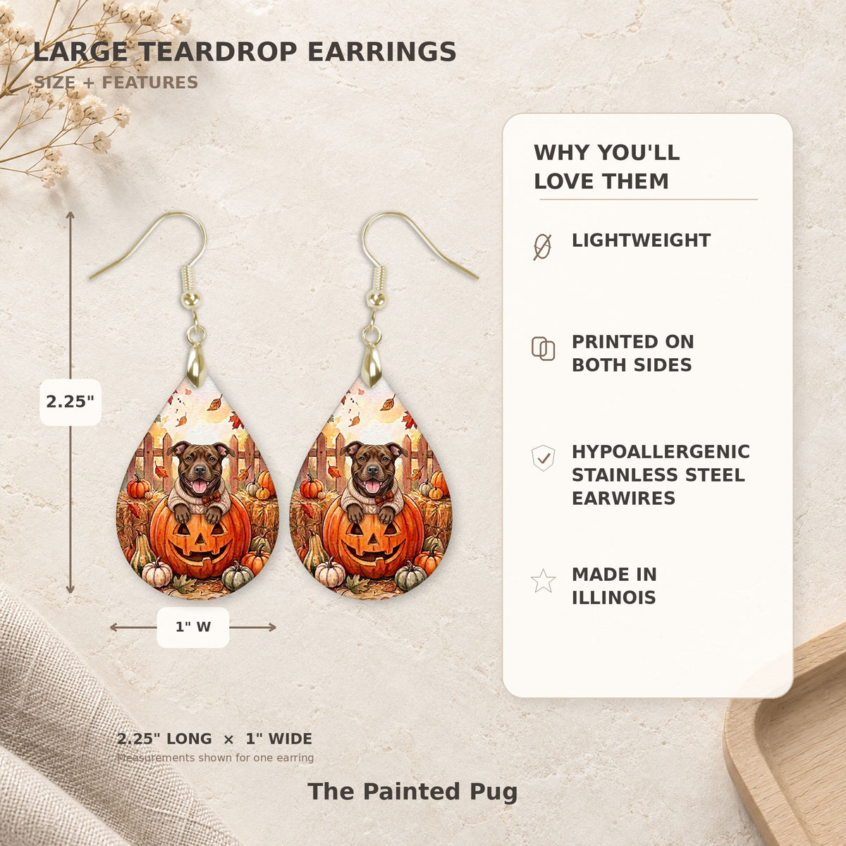 Size and features guide for the pitbull pumpkin teardrop earrings, 2.25 inches long by 1 inch wide