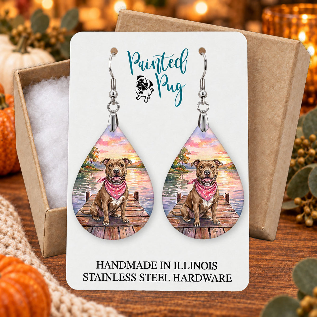 Pitbull lake teardrop earrings gift boxed on a seasonal background