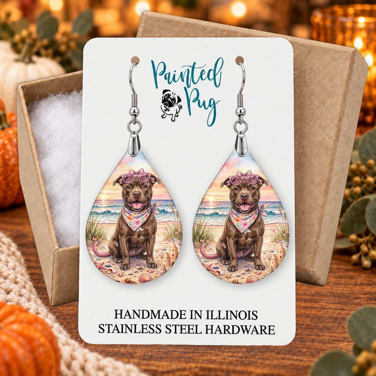 Pitbull beach teardrop earrings gift boxed on a seasonal background