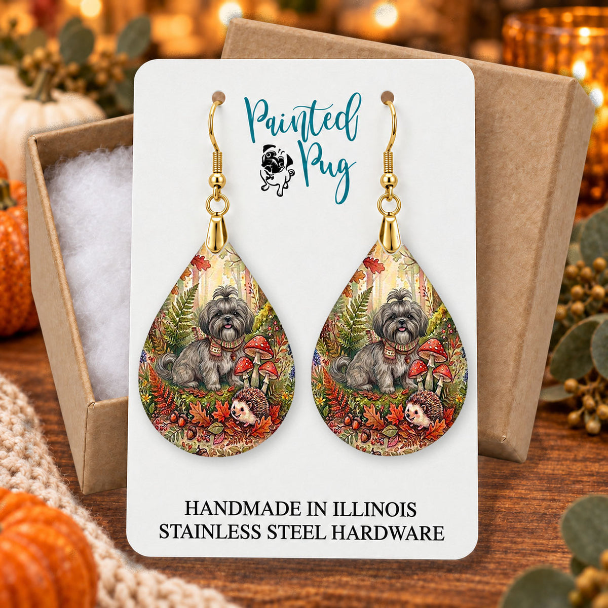 Grey Shih Tzu woodland teardrop earrings gift boxed on a cozy fall background