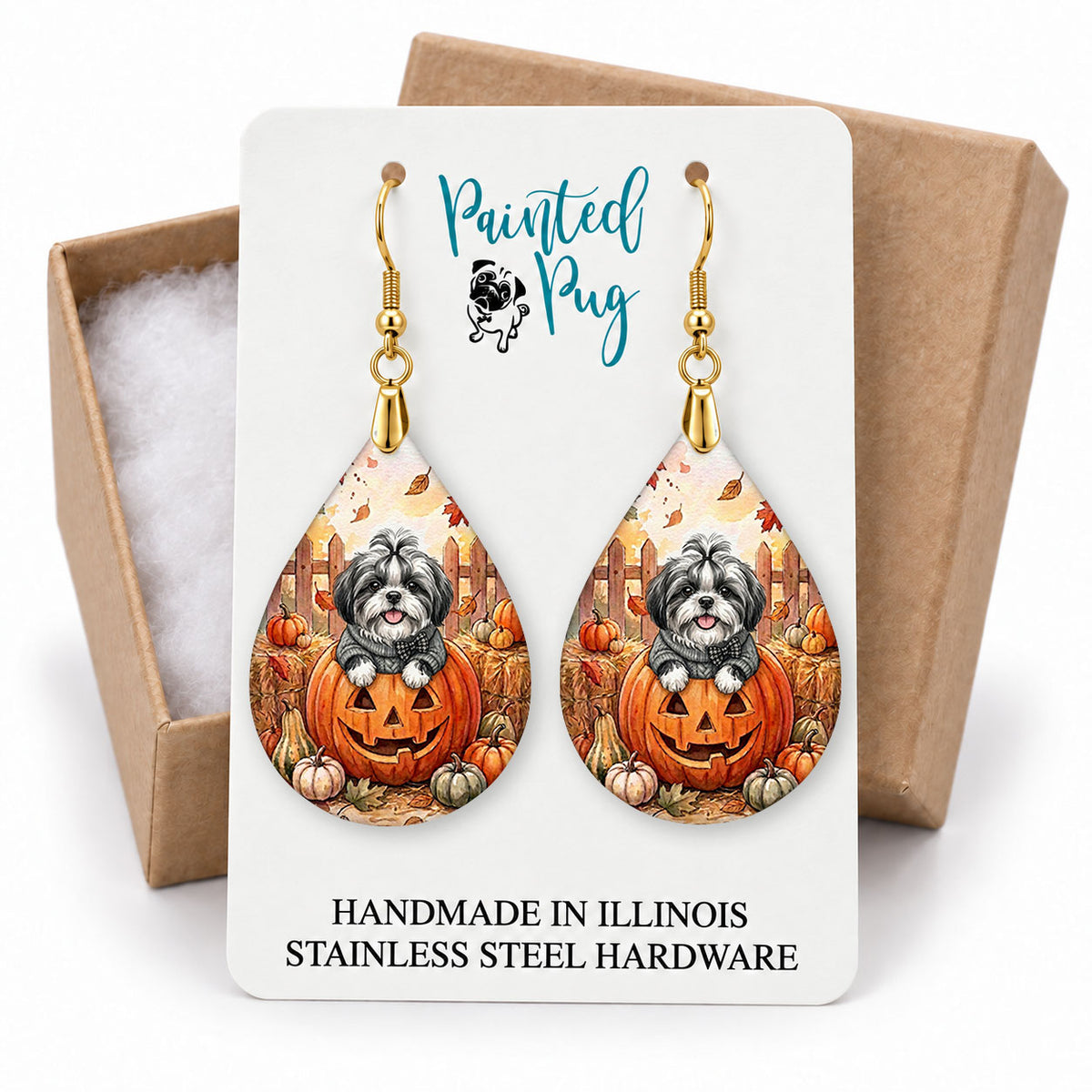 Black and White Shih Tzu pumpkin teardrop earrings on a Painted Pug earring card with a kraft gift box