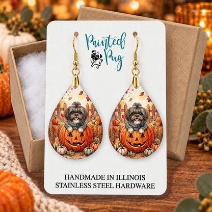 Grey Shih Tzu pumpkin teardrop earrings gift boxed on a cozy fall background