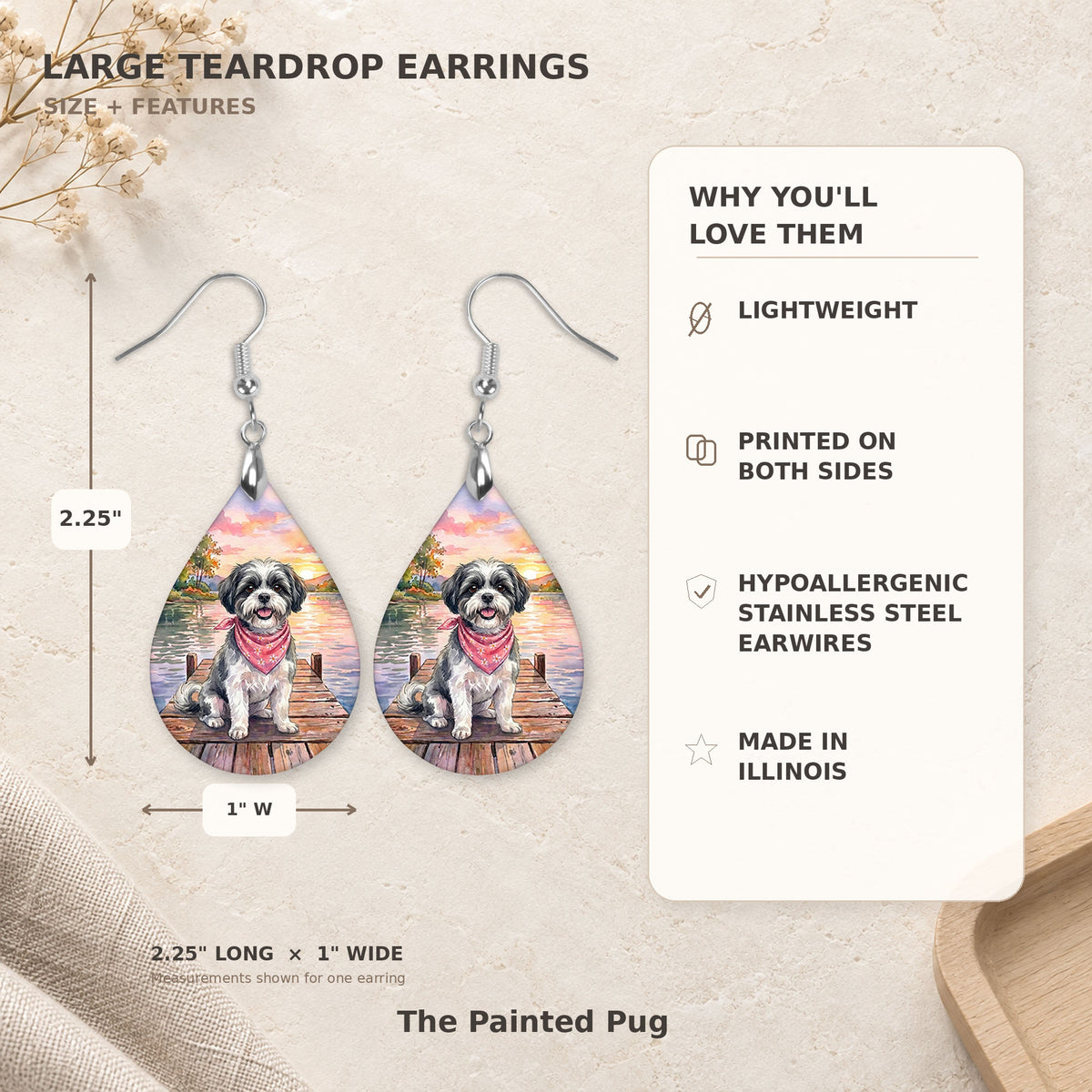 Size and features guide for the black-and-white shih tzu lake teardrop earrings, 2.25 inches long by 1 inch wide