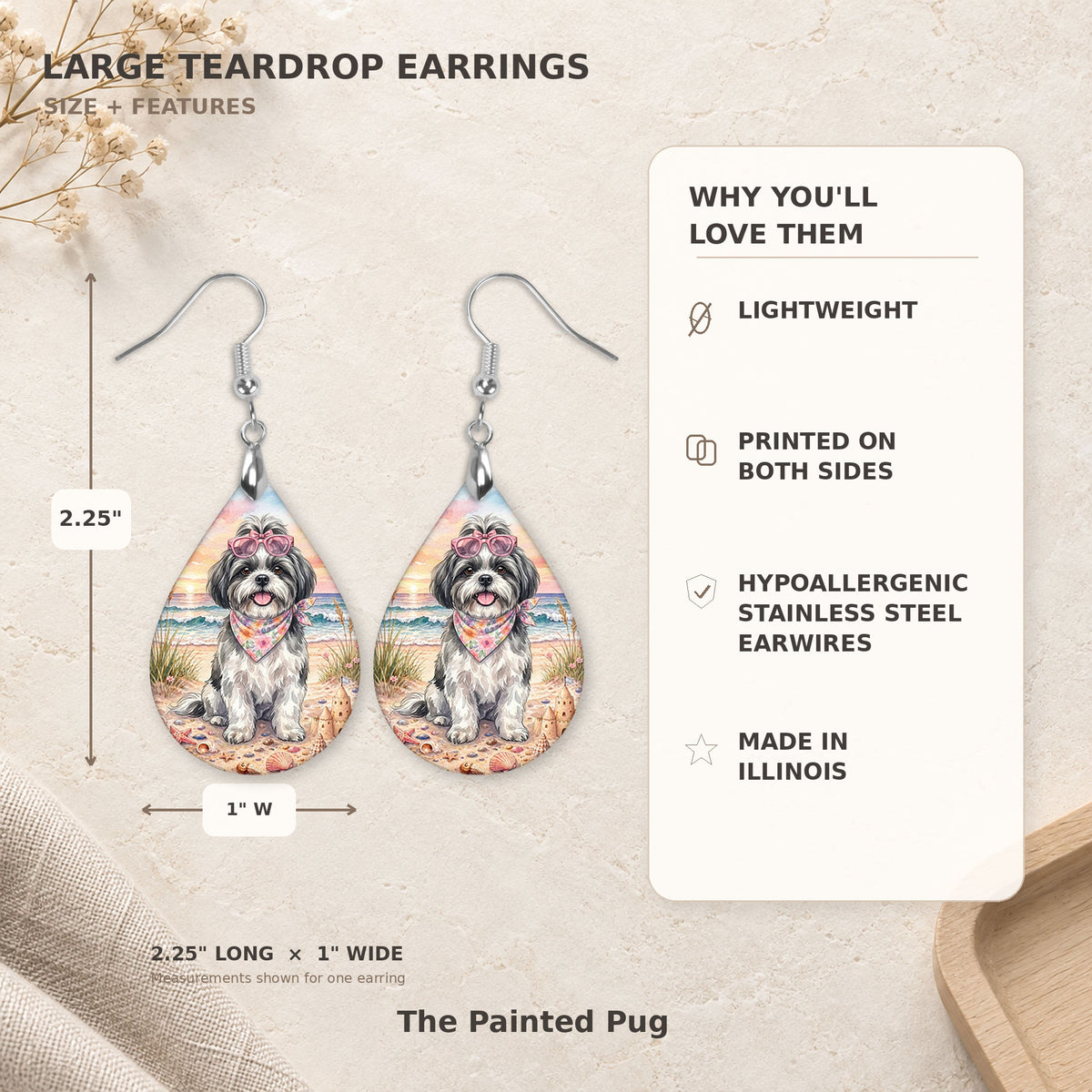 Size and features guide for the black-and-white shih tzu beach teardrop earrings, 2.25 inches long by 1 inch wide