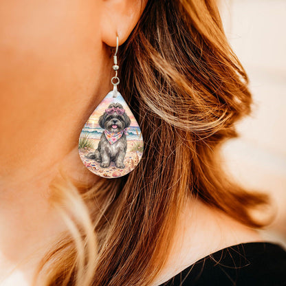 Model wearing grey shih tzu beach teardrop earrings