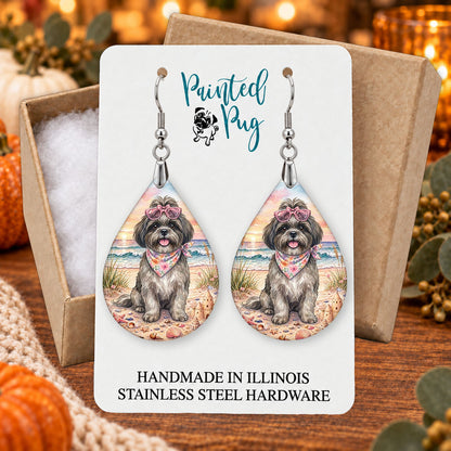 Grey Shih Tzu beach teardrop earrings gift boxed on a seasonal background