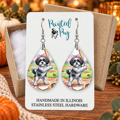 Black and White Shih Tzu baseball teardrop earrings gift boxed on a seasonal background