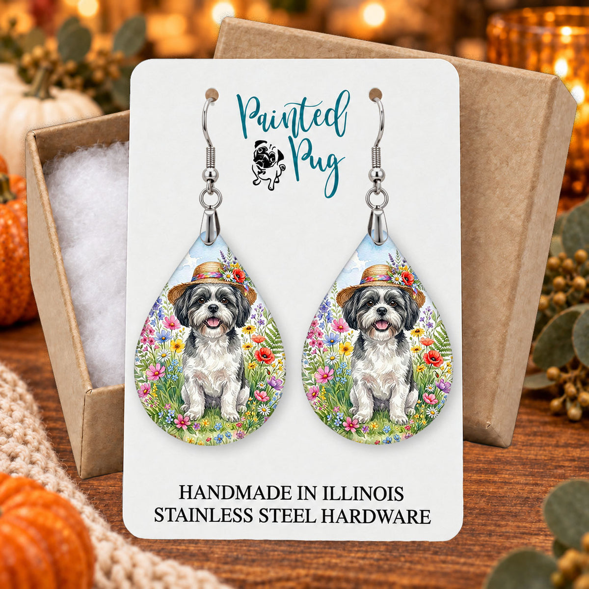 Black and White Shih Tzu wildflower teardrop earrings gift boxed on a seasonal background