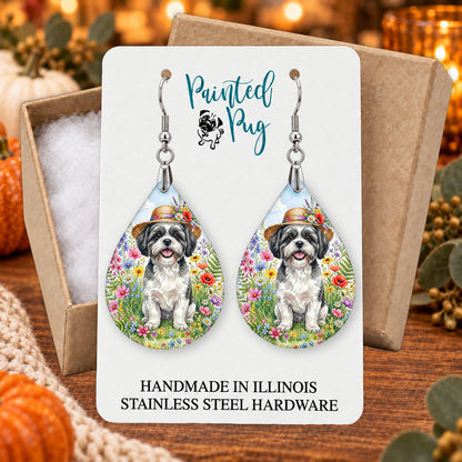 Black and White Shih Tzu wildflower teardrop earrings gift boxed on a seasonal background